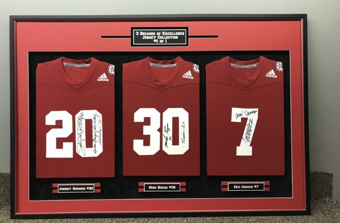 3 Nebraska Heisman Signed Jerseys in one Frame